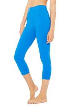 <p>A perennial favorite gets an update with a taller 4.5-inch waistband. In the same smoothing, sculpting design as the original, the High-Waist Airbrush Capri is perfectly on-trend and pairs well with crop tops on those days you can’t bear to bare.</p> Casual Alo Yoga Pants For Yoga, Athleisure Capris For Pilates, Blue Mid-rise Fitted Capris, Blue Fitted Mid-rise Capris, High Waist Athleisure Capris For Workout, Athleisure Solid Color Yoga Capris, Solid Color Athleisure Yoga Capris, Fitted Moisture-wicking Capri Bottoms, Athleisure High Waist Yoga Capris