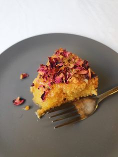 a piece of cake on a plate with a fork