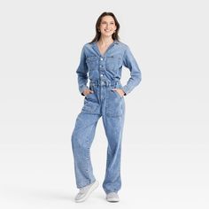 Embrace laid-back style with this Long-Sleeve Utility Baggy Denim Jumpsuit from Universal Thread™. Made of cotton and lyocell, this long-sleeve jumpsuit features a collared neckline with button-down style. This straight-leg jumpsuit comes with a fly button and zipper for a snug, stay-put fit. Designed with barrel cuffs, this jumpsuit sports two front pockets, two side pockets and two back pockets. Universal Thread™: Found exclusively at Target. Universal Thread Jumpsuit, Casual Medium Wash Overalls For Fall, Casual Relaxed Fit Overalls For Fall, Casual Fall Overalls With Relaxed Fit, Utility Style Long Sleeve Denim Jumpsuit In Medium Wash, Utility Long Sleeve Medium Wash Denim Jumpsuit, Long Sleeve Medium Wash Denim Jumpsuit In Utility Style, Trendy Medium Wash Long Sleeve Jumpsuits And Rompers, Trendy Long Sleeve Medium Wash Denim Jumpsuit