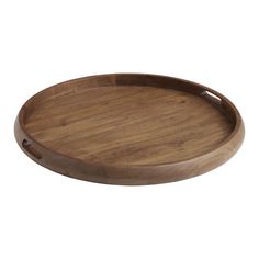 a round wooden tray with handles on an isolated white background for use as a serving platter