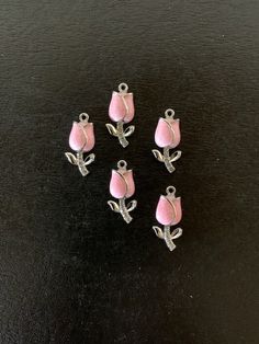 "5 pastel pink and silver tone tulip charms with rhinestone accents on stem, pink tulip charm, tulip charm, tulip pendant, tulip jewelry, pink flower charm, pink tulips, charms flower Choose pink or darker pink.   ★ Charm Size: 7/8\" L X 3/8\" W.           ★ More charms, beads, pendants, jewelry making supplies and buttons available at https://www.etsy.com/shop/ElevenWestDesigns" Pink Flower Charm Necklace With Flower Pendant, Pink Flower Pendant Jewelry With Charms, Tulip Jewelry, Pink Charm, Pink And Silver, Pink Tulips, Flower Charm, Pink Flower, Jewelry Making Supplies