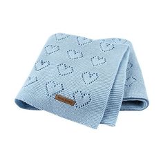 a blue knitted tie with holes on it