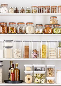 the shelves are filled with many different types of food