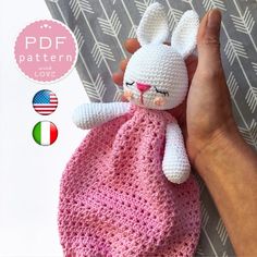 a crocheted bunny in a pink dress with an american flag tag on it