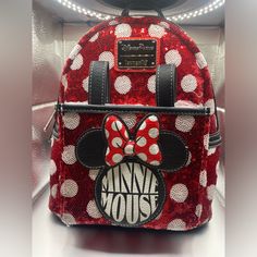 This Disney Parks Loungefly Backpack Features A Stunning Red Exterior With Sequin Accents That Will Make Any Minnie Mouse Fan Swoon. Ms Marvel Cosplay, Loungefly Backpack, Disneyland Castle, Disney Pixar Up, Headband Holder, Loungefly Bag, Marvel Cosplay, Loungefly Disney, Disney Parks