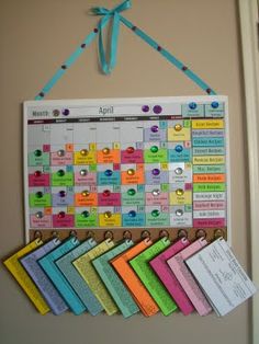 an image of a bulletin board hanging on the wall with magnets attached to it