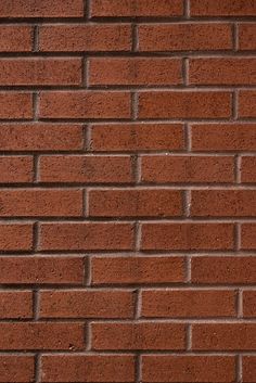 a red brick wall with no mortar or mortars