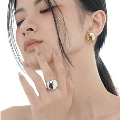 Heritage of Vintage Portraiture Crafted with exquisite workmanship, the "Timeless Imprint S925 Sterling Silver Irregular Portrait Ring" embodies the essence of vintage Thai silver. Each ring is a profound homage to history, with the Thai silver portrait design not only conveying ancient wisdom but also signifying a pursuit of exceptional personality and taste. Specifications: Size: Adjustable Materials: 925 Silver Color: Platinum, 18K Gold Timeless Silver Sterling Dome Ring, Timeless Silver Dome Ring, Timeless Silver Dome Ring Tarnish Resistant, Silver Tarnish Resistant Oval Ring, Timeless Silver Tarnish-resistant Dome Ring, Silver Tarnish-resistant Oval Ring, Silver Plated Ring Jewelry, Elegant Sterling Silver Dome Ring With Polished Finish, Timeless Open Ring Jewelry With Shiny Finish