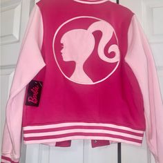 Barbie Varsity Jacket, Sweatshirt Material New With Tags A Perfect Condition. Original Purchaser. Trendy Hooded Cotton Varsity Jacket, Trendy Cotton Hooded Varsity Jacket, Cotton Varsity Outerwear With Patchwork, Trendy Fleece Outerwear With Ribbed Cuffs, Pink Varsity Long Sleeve Outerwear, Pink Winter Varsity Jacket, Pink Long Sleeve Varsity Jacket For Winter, Pink Long Sleeve Varsity Outerwear, Pink Cotton Varsity Jacket For Winter