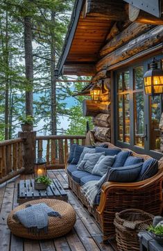 a wooden porch with wicker furniture and lights on the ceiling, along with large windows