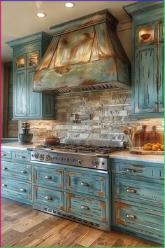 a kitchen with blue cabinets and an oven