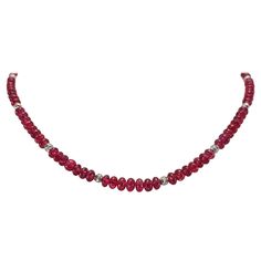 This Natural red Spinel Rondel Beaded Necklace with 18 Carat white Gold is hand cut in German quality. The hexagonal screw clasp is easy to handle and very secure. Finding this high quality gem material in a necklace is very rare! Timeless and classic design combined with high translucent red Spinel rondels and 18kt Gold reveal an individuel, unique and exclusive product. Origin: Burma Spinel diamter: 4-6 mm Red Spinel, Artisan Bracelets, Natural Red, Classic Design, Opal, Beaded Necklace, Jewelry Necklaces, Gems, White Gold