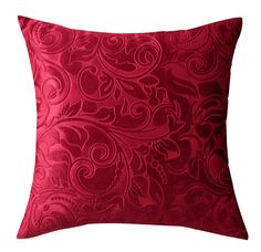 a red decorative pillow on a white background