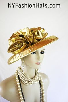 "Women's Metallic Gold Big Brim Custom Made Couture Lame Fabric Formal Designer Fashion Hat. This Elegant Dress Hat Is Embellished With A Large Bow And A Large Sequin Applique. A Row Of Clear Acrylic Black Encased Rhinestones Encircle The Upper Portion Of The Crown Crown Measures 22.5\". Standard Sized Fits Most Women Condition Is New Custom Made This Formal Luxury Large Wide Brim Hat Is Suited For Weddings, Formals, Church, Shabbat, Mother Of The Bride Or Groom, Formal Special Occasion Events A Luxury Gold Hat For Wedding, Luxury High Crown Gold Hats, Elegant Gold Evening Hats, Luxury Gold Wide Brim Hat, Luxury Gold Hat Headpiece, Bespoke Hats, Large Brim Hat, Lame Fabric, Veiled Hats