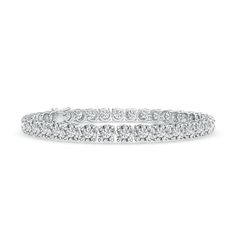 This classic tennis bracelet is a piece of striking beauty. The prong-set round lab-grown diamonds exude a breathtaking sparkle that's hard to miss. This bracelet secures with a catch clasp. Classic Wedding Tennis Bracelet With Single Cut Diamonds, Classic Single Cut Diamond Tennis Bracelet For Wedding, Classic Tennis Bracelet With Single Cut Diamonds For Wedding, Classic Tennis Bracelet In Diamond White With Diamond Cut, Anniversary Lab Grown Diamond Bracelet With Round Cut, Lab Grown Diamond Bracelet For Anniversary, Lab Grown Diamond Round Cut Bracelet For Anniversary, Classic Diamond White Tennis Bracelet For Anniversary, Brilliant Cut Tennis Bracelet For Anniversary