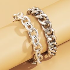 Keep it classic with these sleek silver-plated bracelets boasting a simple curb chain design. Includes two silver-plated curb chain bracelets (two bracelets total) 6.2'' long with 1.9'' extender Lobster claw clasp Silver-plated copper Adjustable Silver Cuban Link Metal Bracelet, Adjustable Silver Chain Cuban Link Bracelet, Trendy Silver Charm Bracelet With Extender, Silver Curb Chain Link Bracelet, Adjustable Silver Bracelet With Curb Chain, Adjustable Silver Cuban Link Chain Bracelet, Adjustable Silver Cuban Link Bracelet, Trendy Double Chain Metal Bracelet, Trendy Metal Double Chain Bracelet