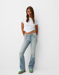 Low waist boot-cut jeans - Jeans - BSK Teen | Bershka Denim Jeans With Five Pockets And Flared Hem, Fall Flare Jeans With Five Pockets, Casual Medium Wash Jeans With Flared Hem, Casual Medium Wash Flare Jeans With Flared Hem, Casual Medium Wash Flare Jeans, Flared Stretch Jeans With Five Pockets, Stretch Flare Jeans With Five Pockets, Casual Flare Jeans With Flared Hem For Fall, Trendy Fitted Jeans With Flared Hem