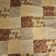 an old patchwork quilt with many different colors