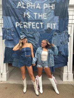 two women standing next to each other in front of a blue sign that says, alohah is the perfect fit