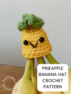 a crocheted pineapple hat sitting on top of bananas with the caption, pineapple banana hat crochet pattern