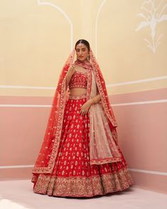 Elegant red raw silk bridal lehenga with intricate embroidery Red Dola Silk Sharara With Sheer Dupatta, Red Chanderi Dupatta For Reception, Designer Wear Red Dupatta With Dori Work, Designer Red Dupatta With Dori Work, Red Dola Silk Anarkali Set With Sheer Dupatta, Red Art Silk Set With Sheer Dupatta, Red Traditional Wear With Sheer Dupatta And Kundan, Red Dola Silk Sets With Sheer Dupatta, Red Cutdana Lehenga With Traditional Drape