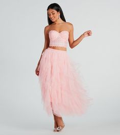 Bring a little drama to your look with this ruffled tulle midi skirt that will add a chic flair. It features a high-rise elastic banded waist for comfortable wear, a midi-length hem with a flowy, A-line silhouette, and a sheer ruffled tulle design over a knit lining. Style with a corset top and mules.Fit & FeaturesHigh-rise elastic banded waistMidi-length hemFlowy, A-line silhouetteSheer ruffled tulle fabricKnit lining, minimal stretchRuns true to size Long Tule Skirt, Pink Tulle Skirt, Pink Midi Skirt, Tulle Midi Skirt, Tour Outfits, Pink Tulle, Fashion 2024, Black Midi Skirt, Party Outfits