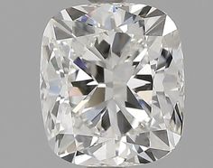 a cushion cut diamond on a gray background, with the center stone in the shape of a square