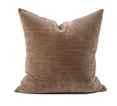 a brown pillow on a white background