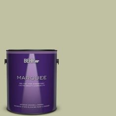 a purple paint can with the words marquee on it's bottom half