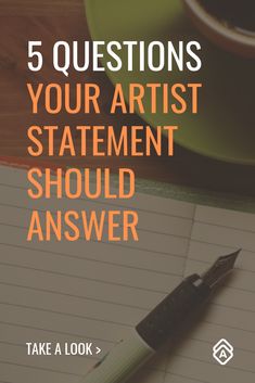 a notepad and pen on top of a desk with the words 5 questions your artist statement should answer