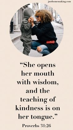 a woman with a child in her lap and the words she opens her mouth with wisdom, and the teaching of kindness is on her tongue