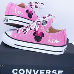 "These pink Converse shoes have Minnie and her name on both shoes. Minnie Mouse laces as well. Crystals on the toes if you so choose during check out. Some people feel that Converse run big. Please consult the following size measurements before ordering to make sure of the size you need. I don't accept returns for the wrong size being ordered: Sizes from heel to toe on soles of shoes: 2 is 4 3/4\" 3 is 5 1/4\" 4 is 5 1/2\" 5 is 5 3/4\" 6 is 6 1/4\" 7 is 6 1/2\" 8 is 6 3/4\" 9 is 7\" 10 is 7 1/2\ Bling Clothes, Minnie Mouse Converse, Minnie Mouse Bedding, Pink Low Top, Diy Tutu Skirt, Twodles Birthday, Shoe Hacks, Minnie Mouse Shoes, Diy Tutu