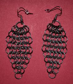 Chainmaille pendant earring. 1/4 inch diameter rings. European 4 in 1 link style. Aluminum or Stainless Steel links with nickel free ear hooks. Chainmail Patterns Earrings, Pendant Earring, Baltimore Md, Ear Hook, Pendant Earrings, Baltimore, Fashion Earrings, Jewelry Earrings Dangle, 4 Inch