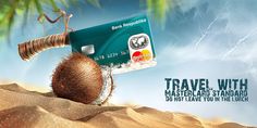 a credit card flying through the air with a palm tree on it's back