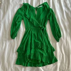 Size Xs Never Worn Shorts Underneath Green V-neck Ruffle Dress For Brunch, Summer Long Sleeve Dress With Ruffled Skirt, Long Sleeve Dress With Ruffled Skirt For Summer, Green Mini Ruffle Dress For Summer, Green Fitted Ruffle Dress For Brunch, Fitted Green Ruffle Dress For Brunch, Chic Green Mini Dress With Ruffles, Green Summer V-neck Ruffle Dress, Green Mini-length Ruffle Dress For Brunch