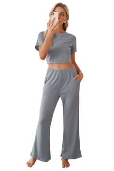 Cropped Tee and Wide Legs Pants Ribbed Knit Lounge Set Casual Ribbed Sets For Spring, Casual Ribbed Sets For Loungewear, Casual Stretch Cropped Sets, Casual Ribbed Summer Sets, Solid Cropped Pants For Loungewear, Solid Cropped Loungewear Pants, Casual Solid Cropped Pants, Casual Solid Color Cropped Pants, Casual Cropped Pants