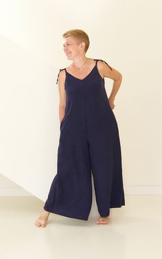 "This loose jumpsuit is the most comfy outfit you have worn ever! Flattering and flowy cut fits pretty much any size. Natural linen is a cool wear on a warm summer day. Choose from 30 colors palette to have outfit for particular occasion. For example - light or bright color for tropical vacation, neutral - as loungewear, dark-rich - for cozy dinner out or city strolling. Just switch on your imagination! If you want this jumpsuit in our exclusive linen colors, please follow this link: https://www Linen Jumpsuits And Rompers With Pockets, Linen Jumpsuits And Rompers For Loungewear, Relaxed Fit Linen Jumpsuit With V-neck, Linen Wide Leg Jumpsuits For Beach, Linen Wide-leg Jumpsuits For Beach, Beach Linen Wide Leg Jumpsuits And Rompers, Wide Leg Linen Jumpsuits And Rompers For Beach, Wide Leg Linen Jumpsuits And Rompers, Jumpsuit Linen