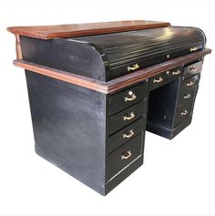 an old fashioned desk with drawers and a large wooden top on it's side