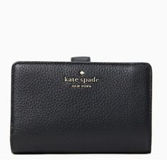 Kate Spade Leila Medium Compact Bifold Wallet Black Color: Black 4.5”H X 5.5”W X 1”D Pebbled Leather Ksny Metal Pinmount Logo Two Way Spade Jacquard Lining Interior: 8 Credit Card Slots, Id Window, 4 Slip Pockets, 2 Bill Folds Exterior: L-Zip Coin Compartment Zip & Snap Closure Dust Bag Not Included Imported Style # Wlr00394 Classic Formal Kate Spade Wallet, Elegant Black Compact Trifold Wallet, Elegant Black Trifold Wallet With Interior Card Slots, Elegant Kate Spade Travel Wallet, Classic Kate Spade Wallets For Daily Use, Black Leather Kate Spade Wallets, Elegant Compact Trifold Wallet, Elegant Black Trifold Wallet, Elegant Compact Trifold Travel Wallet