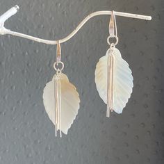 These beauties will definitely draw attention. Super Light Feathers made of Shells and Sterling Silver. Silver Dangle Earrings With Mother Of Pearl, Silver Mother Of Pearl Dangle Earrings, Silver Mother Of Pearl Earrings With Ear Wire, Key West Fl, Key West, Free Spirit, Feathers, Dangle Drop Earrings, Shells