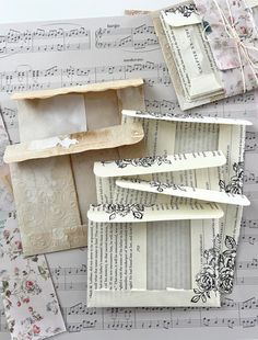 several pieces of paper with music notes on them