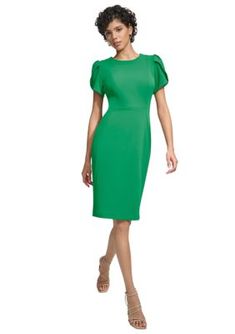 Sharp enough for formal occasions and stylish enough for smaller events, this solid dress from Calvin Klein is updated with short tulip sleeves for a flattering look. | Calvin Klein Women's Solid Sheath Dress, 6 Semi-formal Fitted Dress With Pleated Sleeves, Fitted Dress With Pleated Sleeves For Semi-formal Occasions, Fitted Dress With Pleated Sleeves For Semi-formal Events, Fitted Green Cap Sleeve Dress, Fitted Green Midi Dress With Pleated Sleeves, Fitted Midi Sheath Dress With Pleated Sleeves, Elegant Stretch Midi Dress By Calvin Klein, Fitted Midi Dress With Pleated Sleeves, Elegant Calvin Klein Midi Cocktail Dress