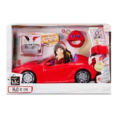 a red toy car with a woman in the driver's seat