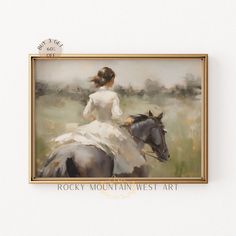 a painting of a woman riding a horse in a field with the words rocky mountain west art above it