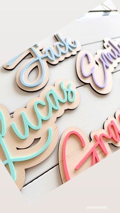 wooden cutouts that say happy new year and have hearts in the shape of letters