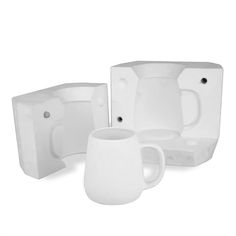 the white dishes and cups are ready to be used