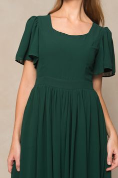 Twirl in style with the Abbie Dress in Emerald Chiffon. The flowy chiffon fabric and subtle sweetheart neckline provide a romantic touch, while the short bell sleeves and maxi-length skirt with functional pockets add a playful twist. This dress is not only the ultimate fall bridesmaids silhouette, but perfect for date night, special events, church and more. With a hidden back zipper, princess seams on the bodice and full lining, you simply can't go wrong. This women's dress is available in up to Short Bell Sleeves, Fall Bridesmaids, Princess Seams, Princess Seam, Skirts With Pockets, Chiffon Fabric, A Romantic, Sweetheart Neckline, Special Events