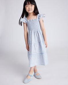 Cottagecore, but make it kid-size. Our 100% Cotton Poplin Smocked Dress channels all those dreamy playtime moments into a charming tiered dress with sweet ruffle trim. Crafted in soft, breathable fabric with smocking for a flexible fit, it's a comfy yet carefree choice for playtime or dress-up days.  | Quince | Poplin Smocked Dress in Blue Ditsy Daisy, Size 12, Cotton Dress Up Day, Blue Daisy, Tea Parties, Smocked Dress, Dresses Kids Girl, Tier Skirt, Ditsy Floral, Tiered Dress, Quince