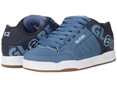 Globe Tilt - Men's Skate Shoes : Navy/Split Vintage Blue : Keep your style going strong with the iconic silhouette and cushioned support of the Globe Tilt skate shoes. Skateboard shoes with leather uppers. Large Globe brandings on upper. Flush and stitched PVC lace eyelets. Hidden lacing options in key areas for added lace protection. Thicker outer sidewalls for added durability. Padded tongue and collar for added comfort. Breathable slip-resistant lining for a more stable skate. Cupsole constru Elastic Lace-up Skate Shoes For Skateboarding, Leather Skate Shoes With Elastic Laces For Streetwear, Leather Skate Shoes With Elastic Laces For Sports, Casual Leather Skate Shoes With Elastic Laces, Low-top Skateboarding Sneakers With Elastic Laces, Low-top Sneakers With Elastic Laces For Skateboarding, Studded Lace-up Sneakers For Skateboarding, Elastic Lace Skate Shoes For Skateboarding, Skateboarding Sneakers With Elastic Laces And Round Toe