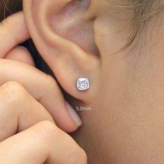 Metal: 925 Sterling Silver Stone: Cushion Cut Carat Weight (Per Stud) 5mm: 0.75 ct 6mm: 1.25 ct 7mm: 2 ct 8mm: 3 ct Setting: Four-Prong Closure: Push Back Minimalist Wedding Earrings, Cushion Cut Earrings, Cushion Cut Moissanite, Type Style, Luxury Earrings, Solitaire Studs, Moissanite Earrings, Diamond Simulant, Cushion Cut Diamonds